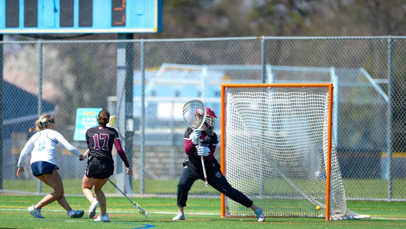 Haley Gamuciello scores against Molly Robison.