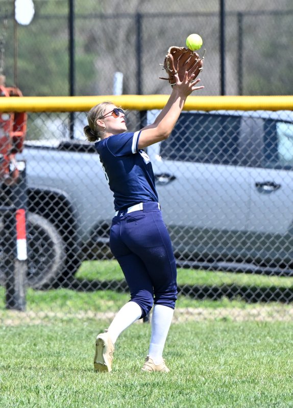 Senior outfielder Ryan Lowe makes an over-the-shoulder attempt in center.