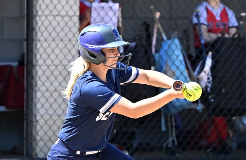 Sussex Academy sophomore Marley Campanese lays down a bunt.