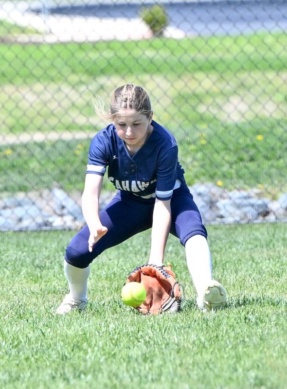 Sussex Academy eighth-grader Aubree Campanese makes a play in left field.