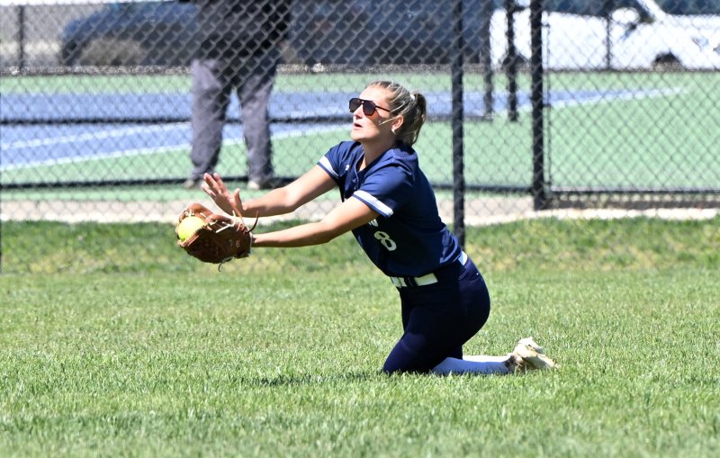Senior outfielder Ryan Lowe makes a diving attempt in center.