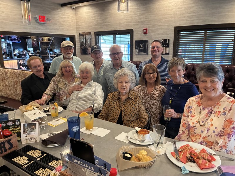 Family and friends gather to remember Steven “Spoonie” Sponaugle and support the Cape music program. Shown are in back (l-r) Sam Sbonna, Bob Taylor, Bob MacConnell and Kevin Brumbach. In front are Larry and Rose Westburg, Jenny Taylor, Joyce MacConnell, Chris Hunt, Denise Brumbach and Georgianne Sbonna.