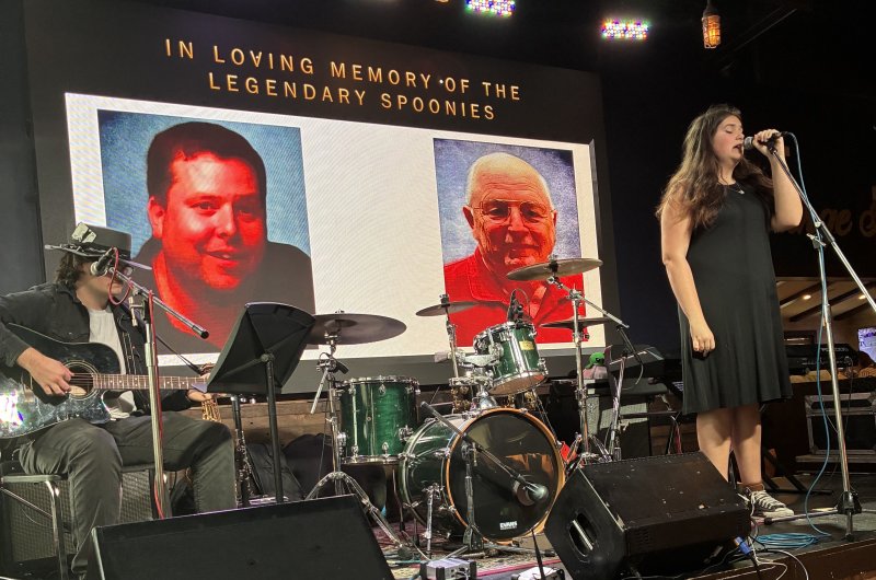 Cape High students Kalel Radcliffe, left, and Anna Currence perform on guitar and vocals during the event.