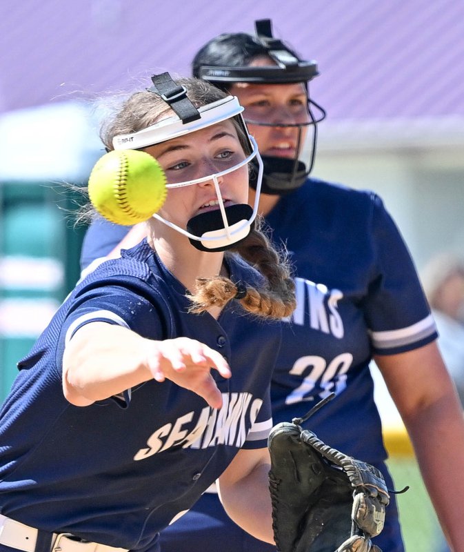 Freshman short stop Danica Bergh throws out a runner.