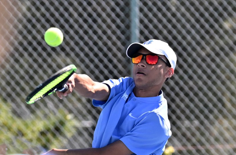 Cape’s DeAngelo Jackson hits a smash at second doubles.