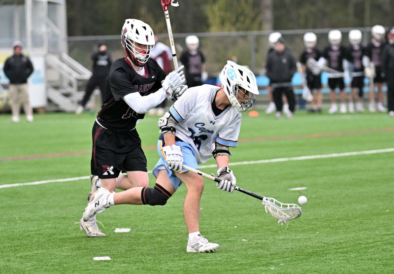 Senior Ryan Morgan scoops up a ground ball for the Vikings.
