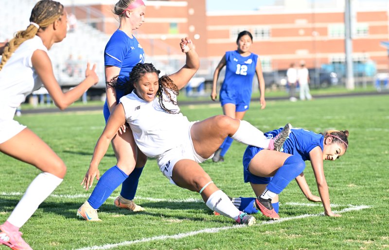 The game was physical from the start with each team getting their uniform grass stained on the pitch. Kierstan Smith gets tangled with Central’s Belinda Roblero Perez.