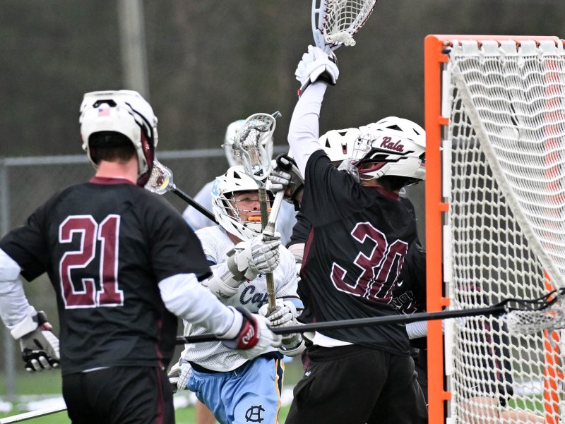 Cape senior Braddock Smith puts a shot past the Radnor goalie Teddy Curry in the 6-4 loss.
