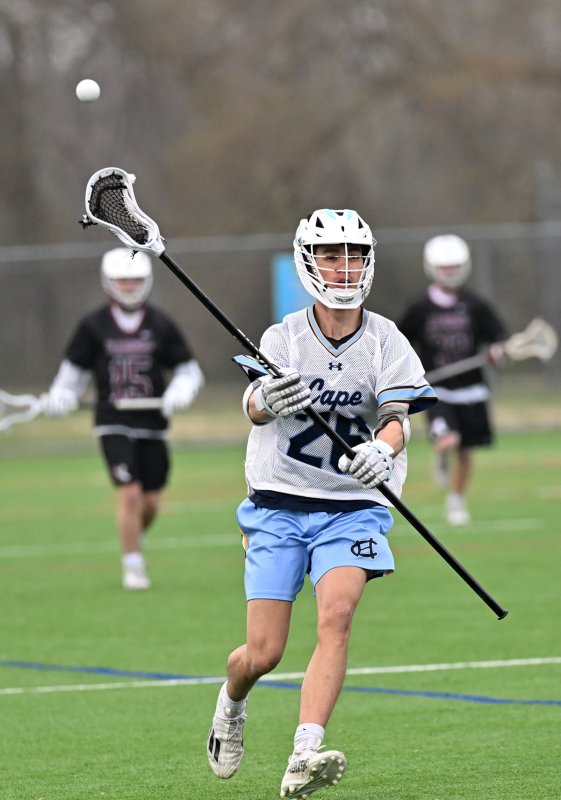 Senior Brooks Leonhartt clears the ball from the Raptors’ offensive end.
