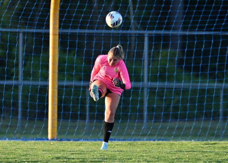 Cape keeper Brynne Fox makes a clear after a save.