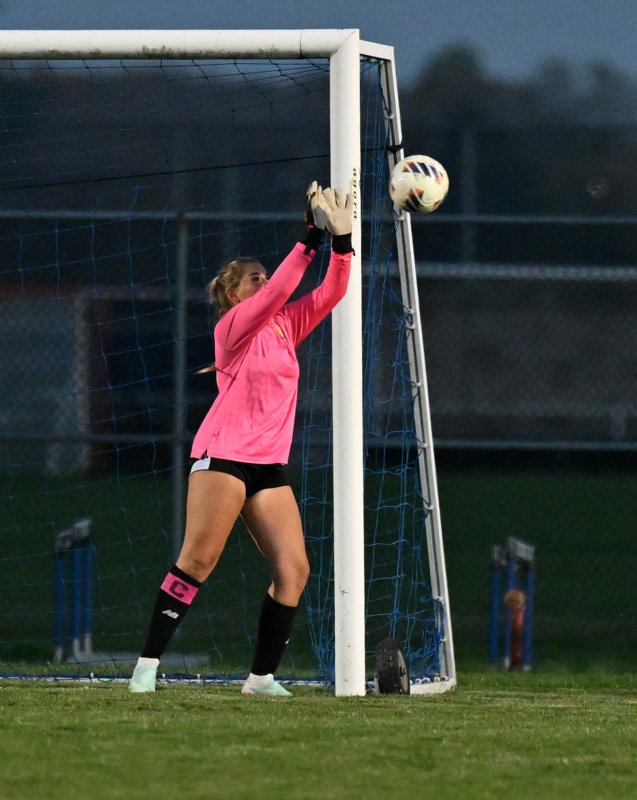 Junior keeper Brynne Fox makes a save in OT.