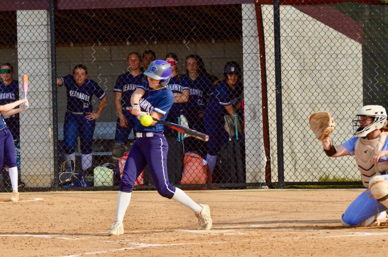 Seahawks sophomore Teagan Forester watches the ball meet her bat.