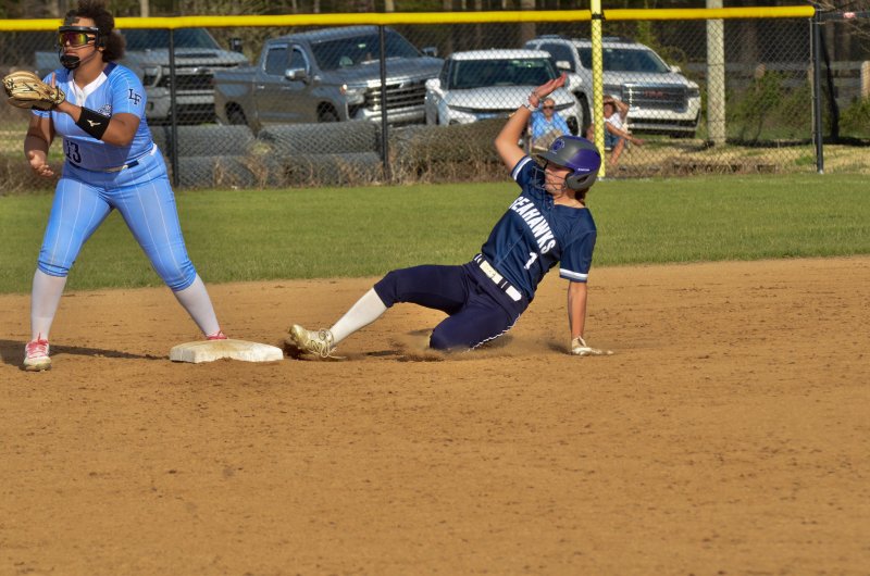 Sussex Academy sophomore Teagan Forester slides into second base.