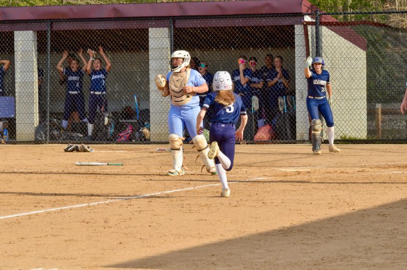 Sussex Academy senior Delainie Monitzer waves in Aubrey Campanese.