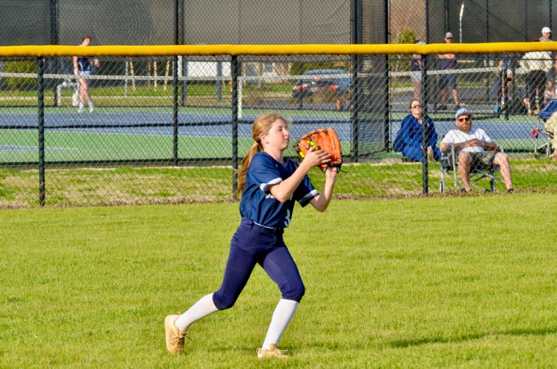 Sussex Academy eighth-grader Aubrey Campanese hauls in an out.