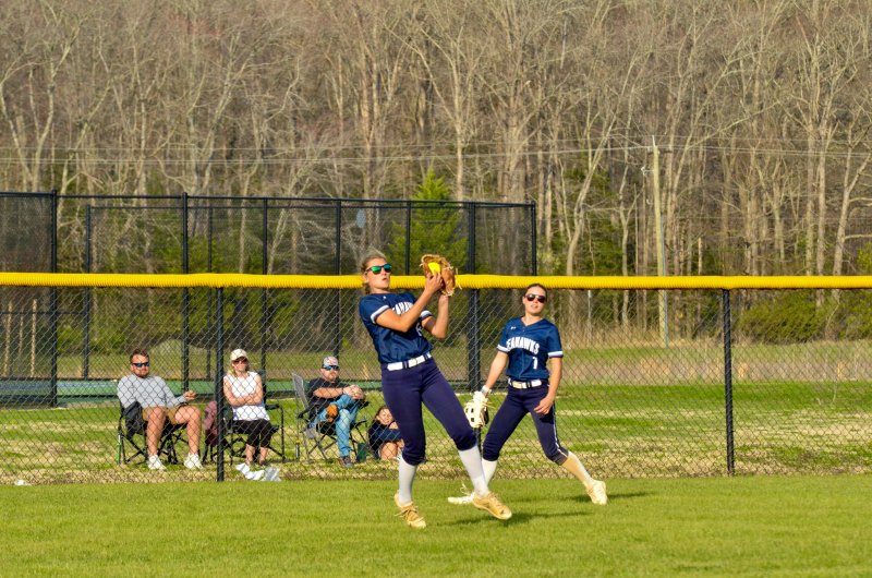 Seahawks senior Ryan Lowe makes the catch with Teagan Forester backing her up.