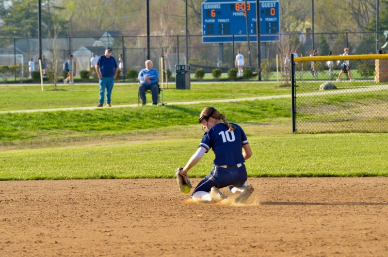 Sussex Academy freshman Danica Bergh flashed her cat-like reflexes on this worm burner that looked destined for grass.