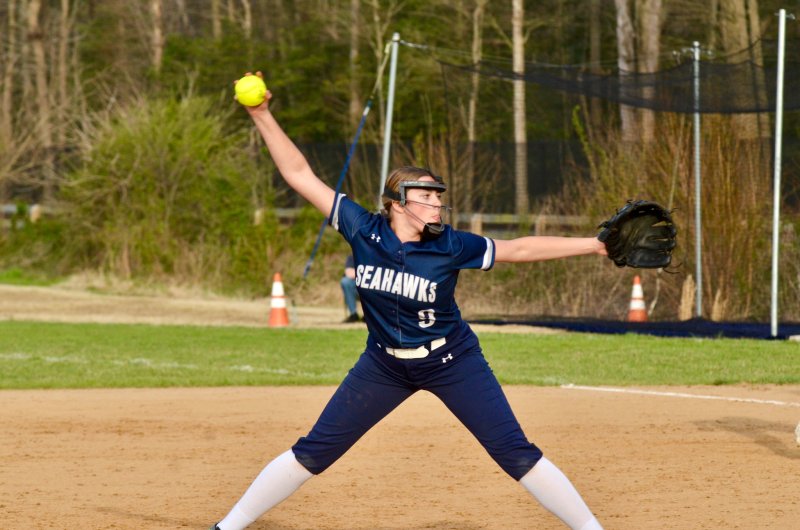 Sussex Academy eighth-grader Rilynn LeCates fires in a strike.