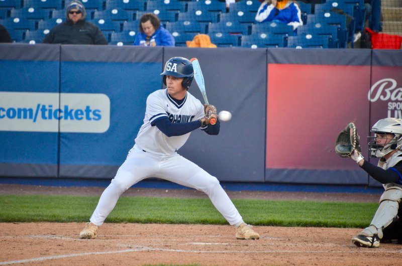 Seahawks senior Victor Goodhue watches a ball above his letters.