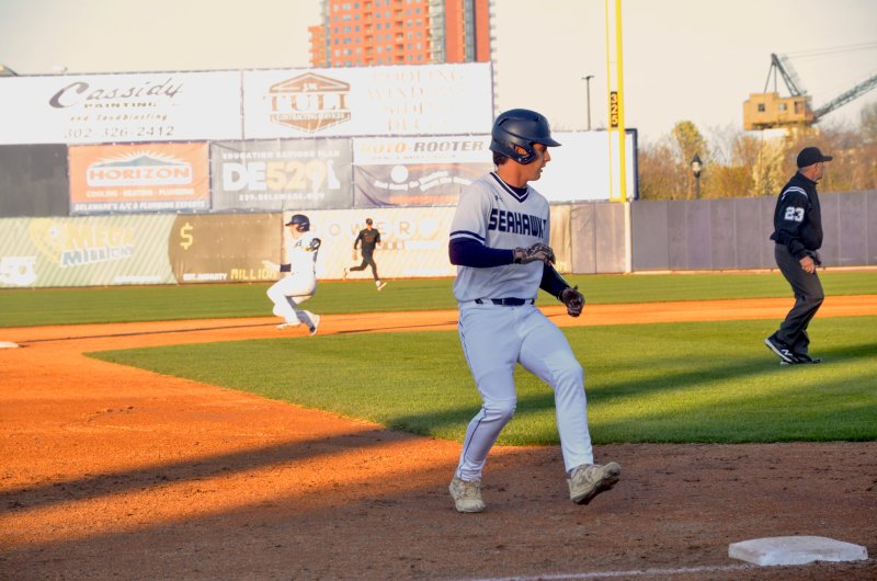 As Seahawks junior Derek Sachs slides into second base, Victor Goodhue settles into third on Mason Glover’s infield single.