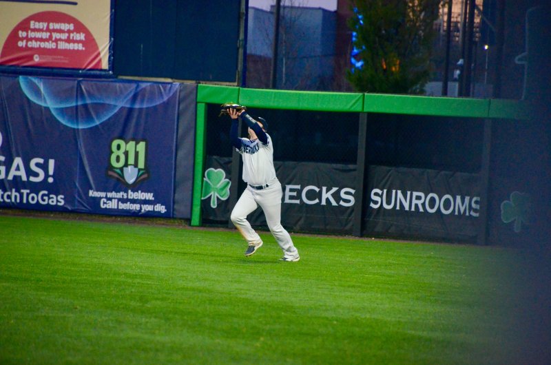 Seahawks junior Derek Sachs squeezes his glove for an out.
