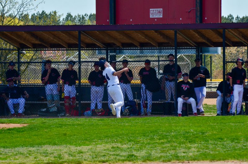Sussex Academy sophomore Ben Tollett reels in a foul ball for an out.