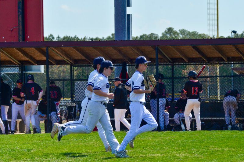 Seahawks junior Derek Sachs, center, continued his stellar play in right field, including a diving catch.