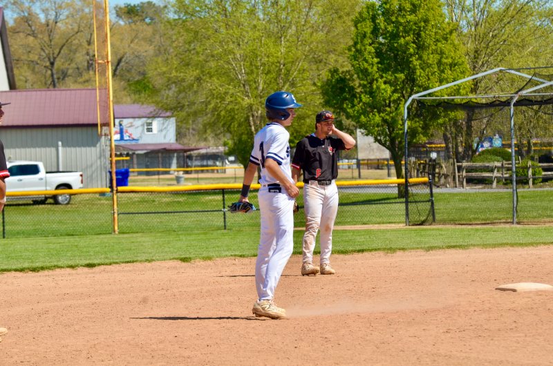 Sussex Academy junior Cole Bunting bounces around second base.