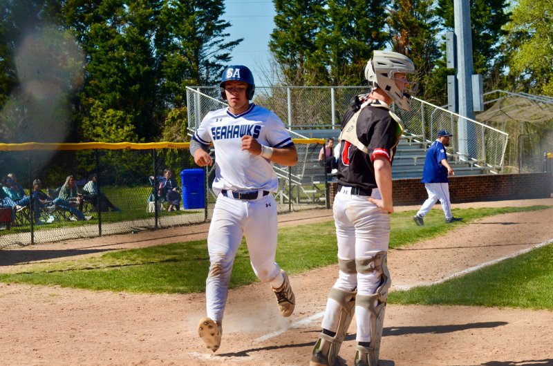 Sussex Academy sophomore Mason Glover scores the third and final run for the Seahawks.