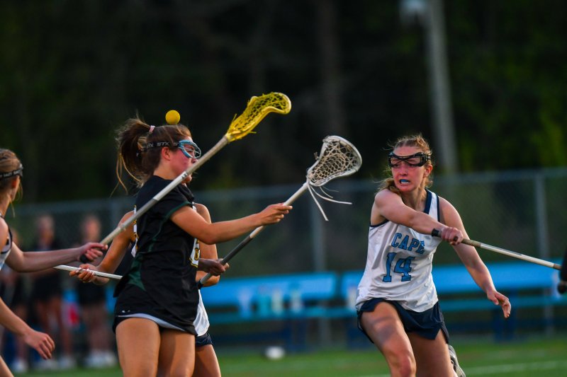 Mairead Rishko checks the ball loose.