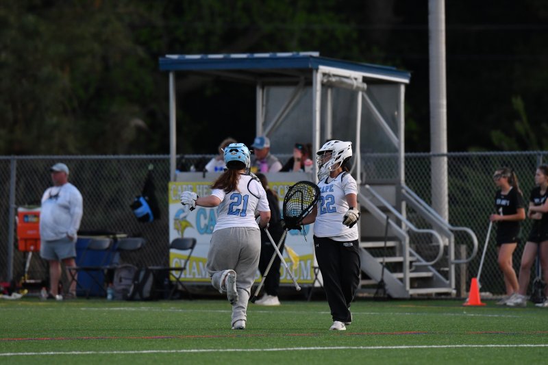 Jordan Murray runs off as Emily Wells comes on.