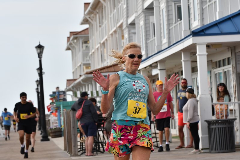Lauri Holdsworth, finishing the Bunny Palooza 5K in 25:33, takes first place in the female 60-64 age group.