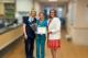 From left to right are Kathleen Boyer, MSN, RN, CMSRN, CNML, Sierra Phillips, CNA, with her Sunshine Award and Rosemary (Rosi) Wurster, DNP, RN, MPH, NEA-BC, CEN. Certified Nursing Assistant