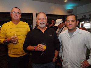 Enjoying the variety of food and drinks while supporting a local charity are (l-r) Jody Rini, Sam Roberts and Eden employee John Rainier. BY STEVEN BILLUPS