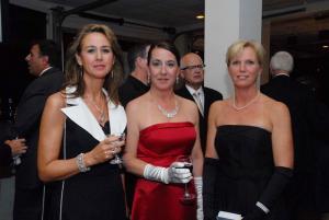 Friends Tarrie Miller, Kelly Sylvester and Ronda Myers enjoy the atmosphere of the annual Beebe Ball. BY STEVEN BILLUPS