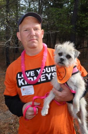 Michael Ferriacci of Laurel and his dog, Christy, are ready to take a hike. Ferriacci received a donated kidney from his wife in 2007. BY RON MACARTHUR
