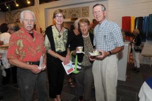 Enjoying the social atmosphere at the opening are (l-r) Howard Butler, Genie Hindall, Sue Walsh and Joe Hindall. BY STEVEN BILLUPS