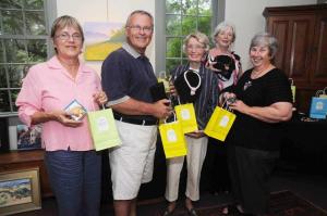 Rehoboth Art League Homestead docents held a fundraising raffle in the Homestead Gallery alongside a display of the Plein Air works. Gift certificates, fine art and jewelry were offered in the raffle. Shown are docents (l-r) Dorothy Dobbyn, Bill Bernardi, Tripp Wilkinson, Judy Lippe and Fay Kempton. BY STEVEN BILLUPS