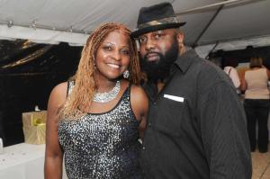 Cape schools para educator Lisa Lindsay enjoys the event with Rick Norwood of Milton. BY STEVEN BILLUPS