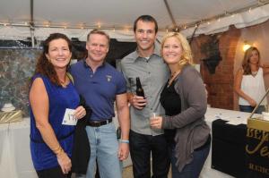 Taking a break from the silent auction bidding are (l-r) Janis Hanwell, Steve Pratt and Ryan and Lindsay Williamson. Hanwell is the former principal of Sussex Consortium. BY STEVEN BILLUPS