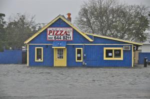 Flooding is starting to reach businesses and homes along Lewes Beach, even with the brunt of the storm hours away. BY RON MACARTHUR