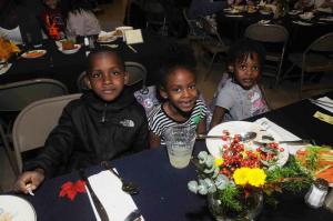 Enjoying their meal with family and friends are (l-r) Neamiah Jackson, Tanoshia Cannon and Stef Whaley. BY STEVEN BILLUPS