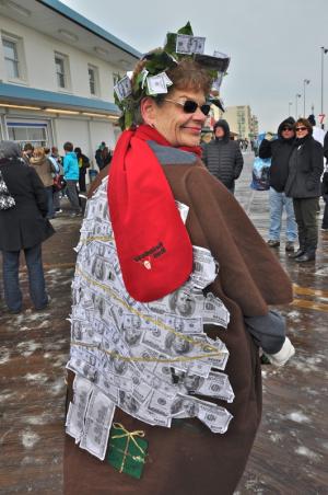Carol Antolik of Wilkes Barre, Pa., says show me the money as she helps raise funds for Special Olympics of Delaware. BY RON MACARTHUR