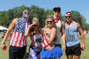 Firefly's atmosphere is fun and eclectic. Shown (l-r) Andrew McKay, Shara Norris, Alicia McKay, Abram McKay and Jake Miller are all decked out in patriotic gear, ready to enjoy the great live music. BY BILLIE CRISWELL