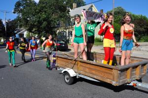 One of the most unusual floats in this year's parade contains the Justice League of America characters. BY RON MACARTHUR