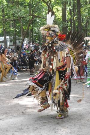 Lead Dancer Keith Henderson of the Cherokee Catawba tribe in Virginia creates a presence in the dance circle.