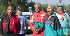 Chief Mark Gould of the Nanticoke Lenni-Lenape Tribal Nation in New Jersey and Dennis Coker, Lenape Indian Tribe of Delaware, Kent County, listen as Chief William Daisey of the Oak Orchard Nanticoke Tribe shares his thoughts on the unity of the tribes. BY DENY HOWETH