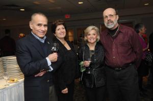 Sussex Family YMCA members and supporters (l-r) Cono and Fran Namorato, Kim Biever and Henry DeWitt socialize before the dinner. BY STEVEN BILLUPS