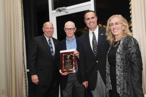 The VanSciver Leadership Award was presented to Sussex Family YMCA Vice Chairman of the Strong Kids Campaign and Vice Chairman of the Board of Governors Jack Vassalotti for his outstanding leadership and his devotion of time and energy to the Sussex Family YMCA. Vassalotti said, “I don’t deserve this, because the people in this room make it easy to do what I do.” Shown are (l-r) Rep. Pete Schwarztkopf, D-Rehoboth; Vassalotti; Sen. Ernie Lopez, R-Lewes; and Sussex Family YMCA Board of Governors Chair Joanne Merlo. BY STEVEN BILLUPS