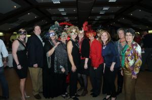 The Sussex County Association of Realtors Community Service Foiundation members gathered for a group photo. Shown in back are (l-r) Paul Fedynich, president-elect; Ruth Silvis, director; and Mindi Carter, director. In front are Cyndi Marsh; Steve Alexander, director; Chris Allen; Donna Carte; Missy Nalewaik, president; Tiffant Carver O'Malley, event chair; Cheryl Meyers; Karen Maull, director; and Mary Jo Timmons. BY STEVEN BILLUPS